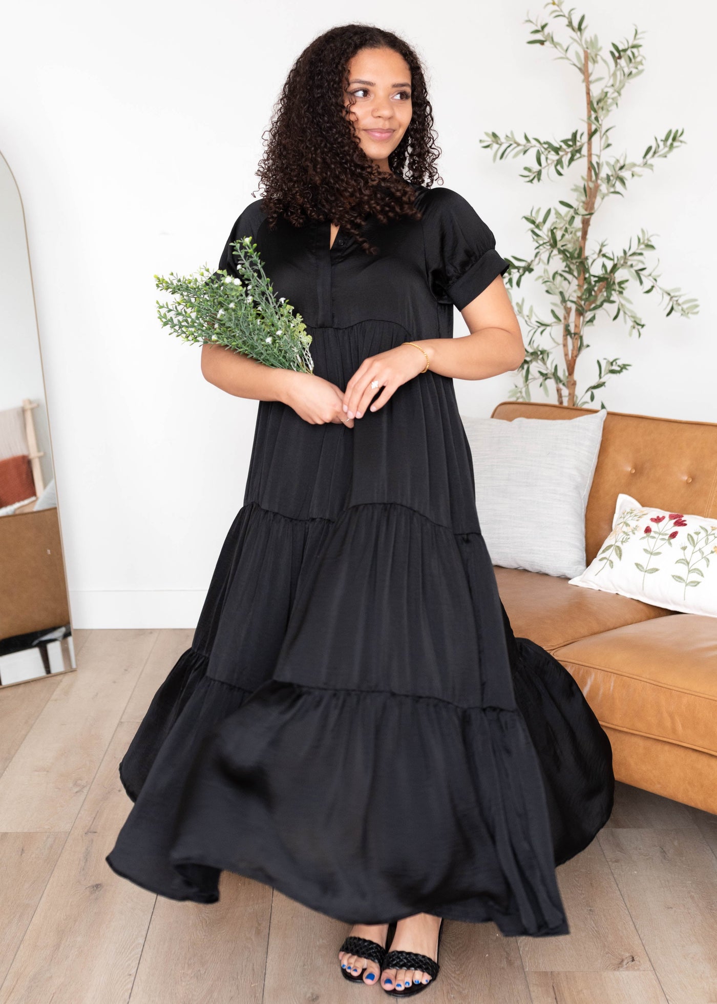 Tiered black satin dress