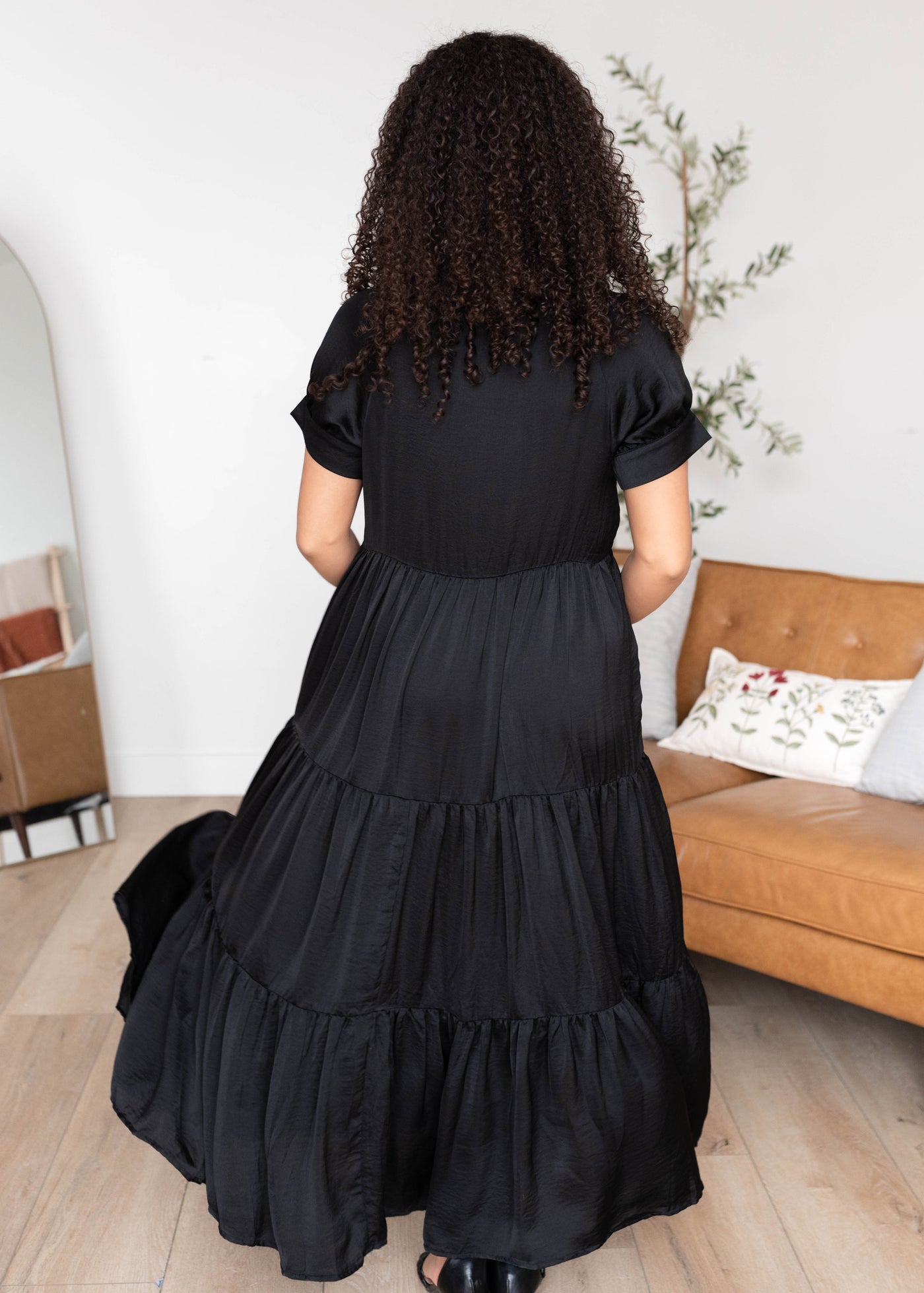 Back view of the black satin dress