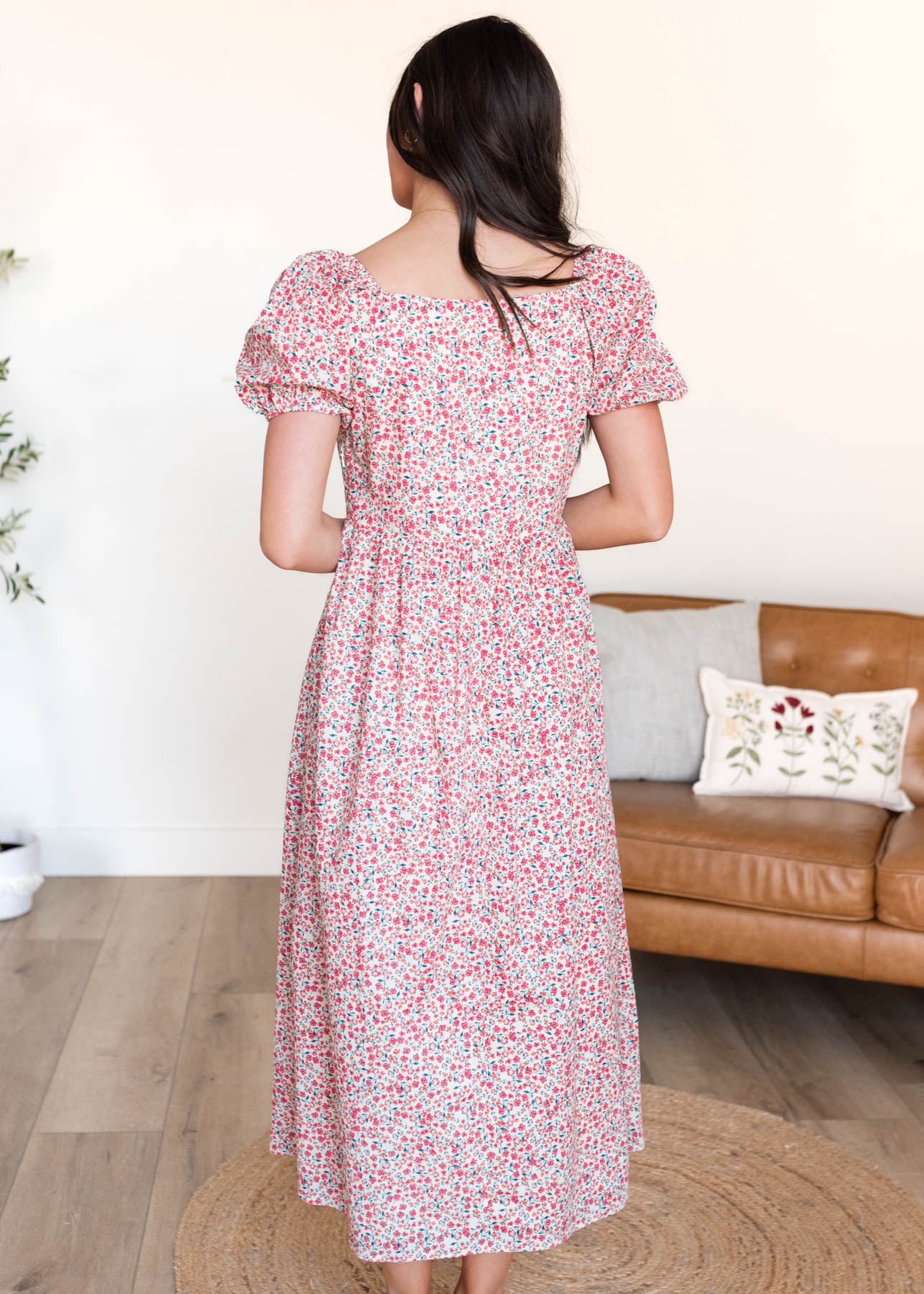 Back view of the red floral puff sleeve dress