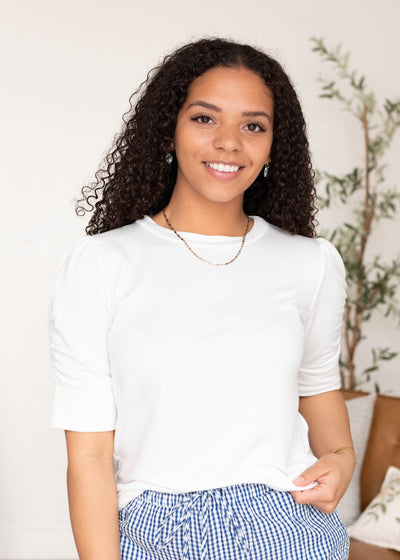 Ivory ruffle sleeve top with short sleeves