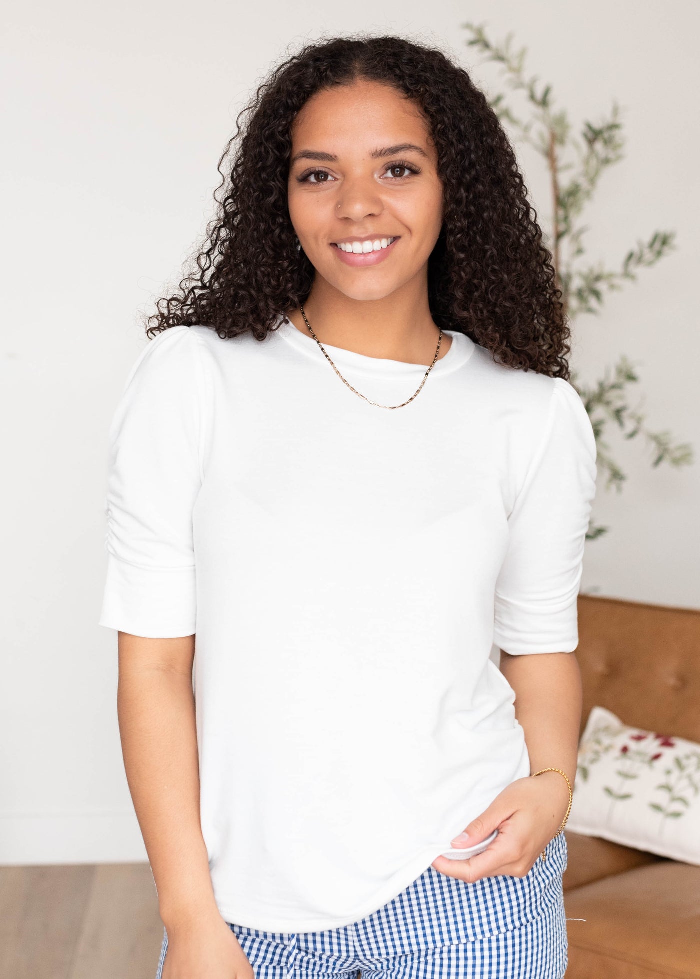 Short sleeve ivory ruffle sleeve top