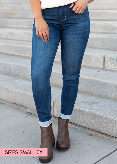 Dark mid rise jeans with folded cuff