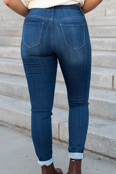 Back view of the dark mid rise jeans