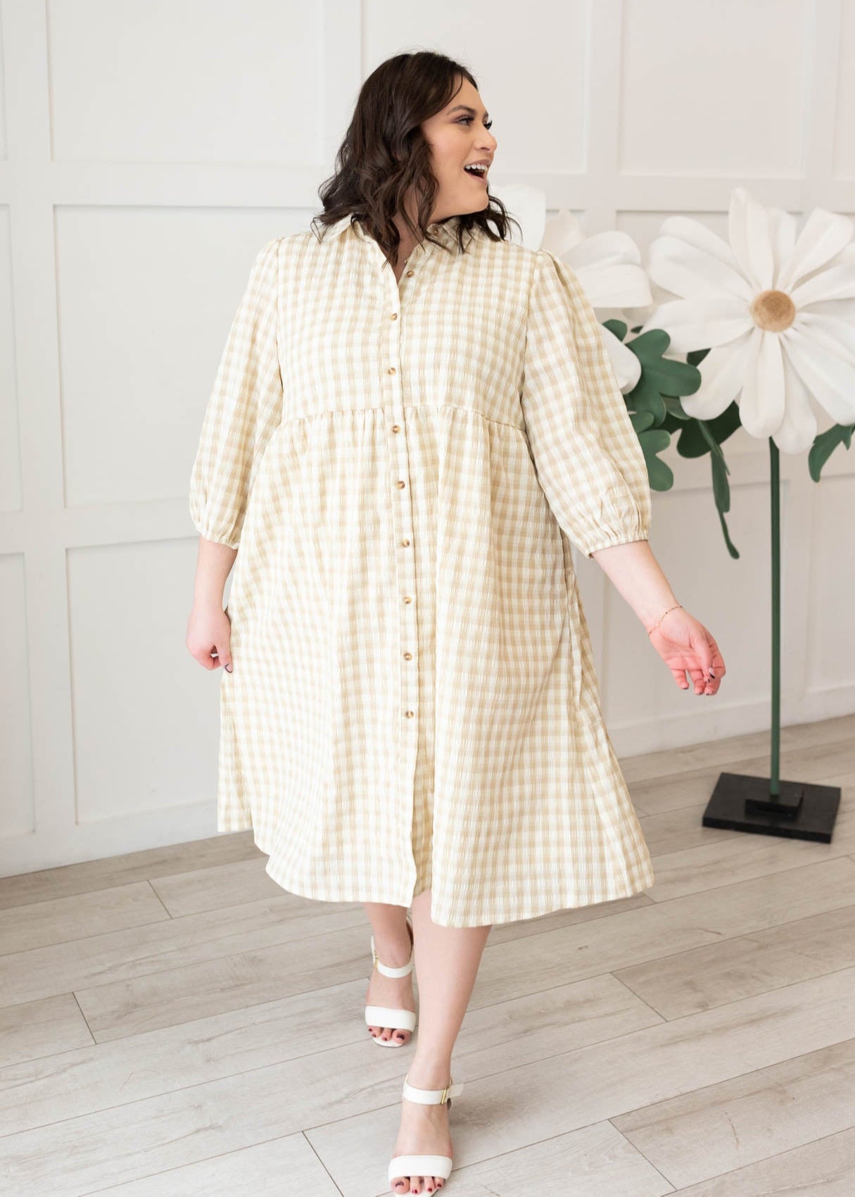 Plus size taupe gingham button down dress with three quarter sleeves