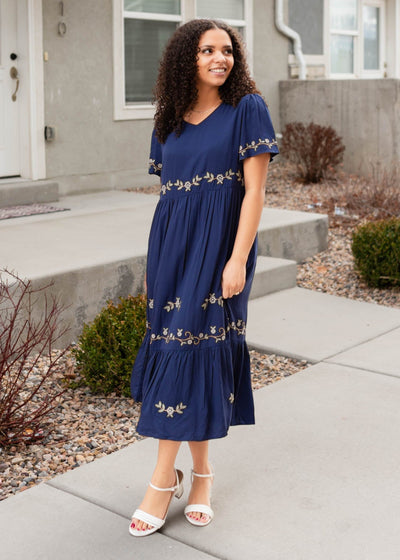 Navy embroidered dress with a v-neck