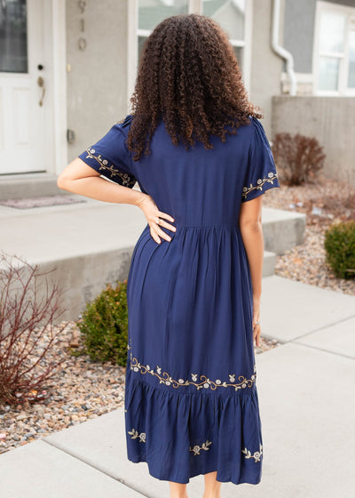 Back view of the navy embroiered dress