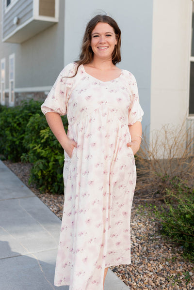 Plus size lavender blush floral dress with wide v-neck and pockets