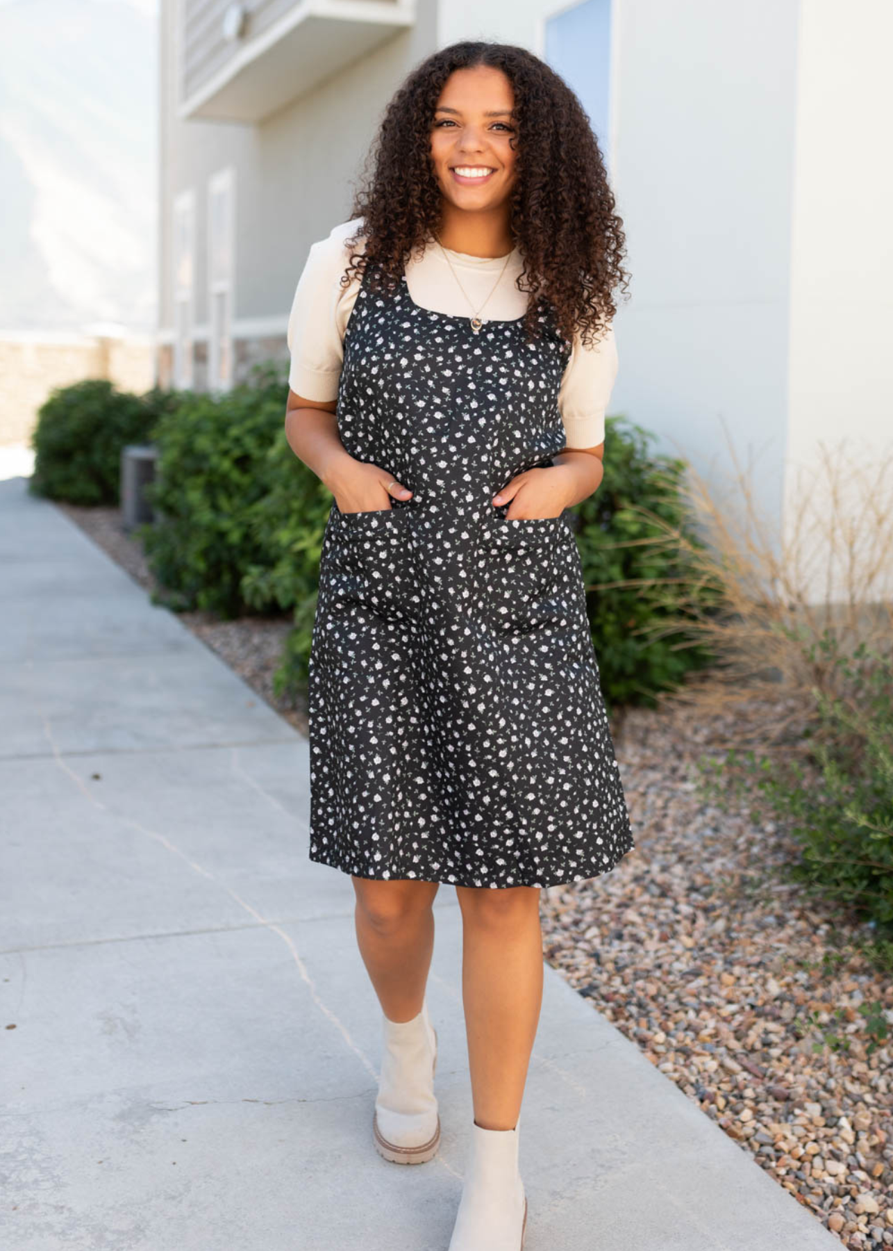 Sleeveless black floral jumper dress