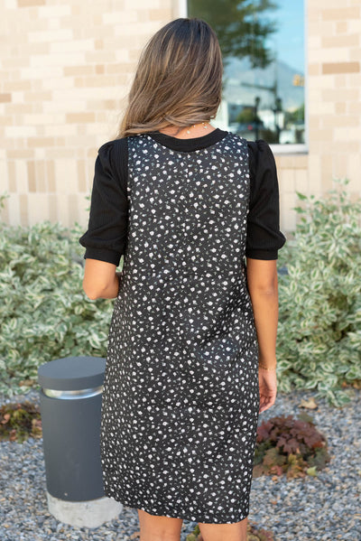 Back view of the black floral jumper dress