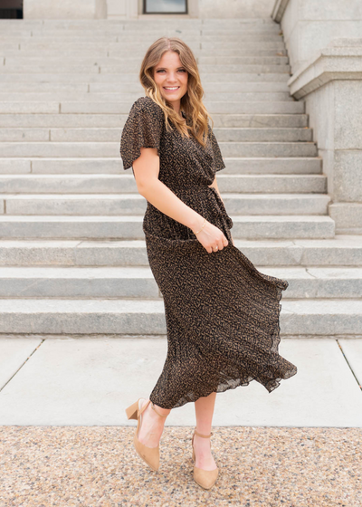 Black pleated dress with pleated skirt