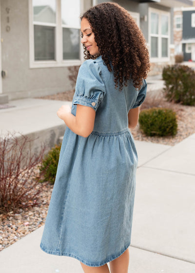 Side view of the denim zip up dress