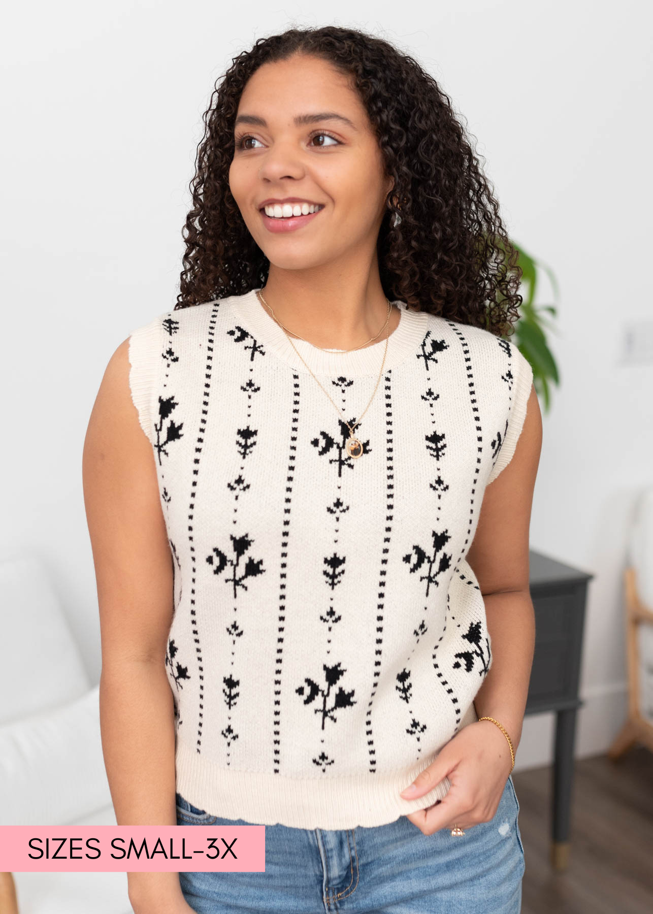 Black floral sweater vest