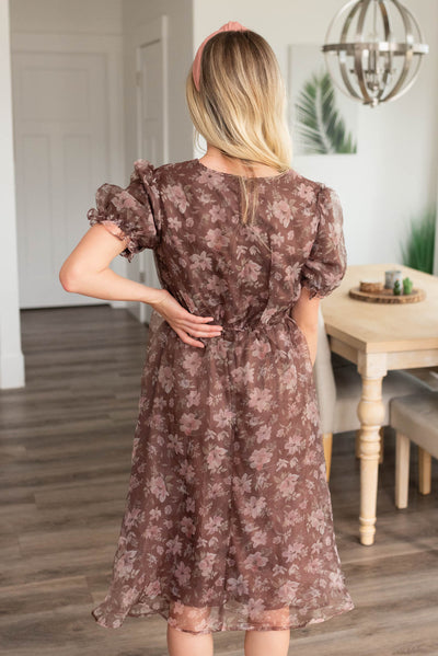 Back view of the brown floral organza dress