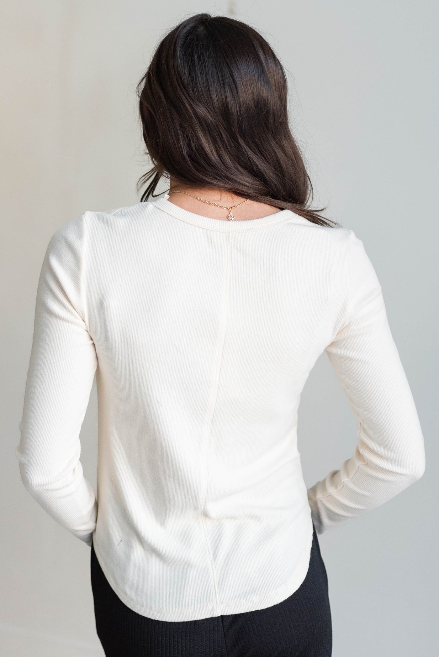 Back view of the cream long sleeve top