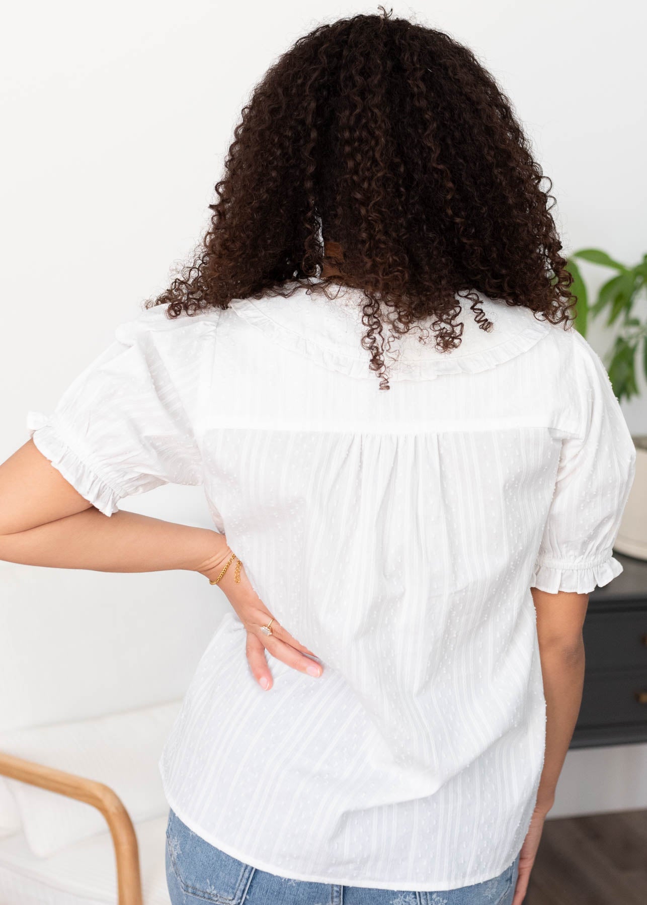 Back view of the white button blouse