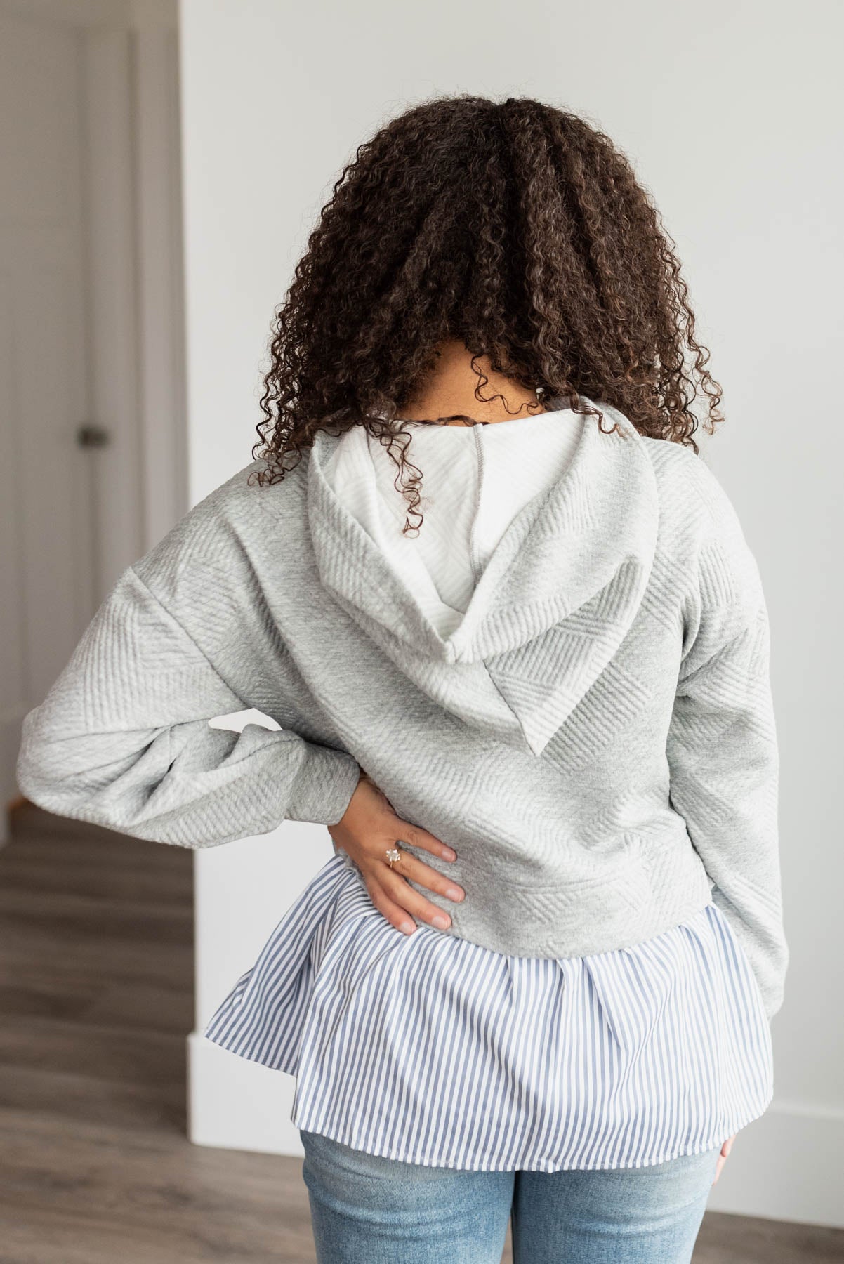 Back view of the heather rey textured hoodie