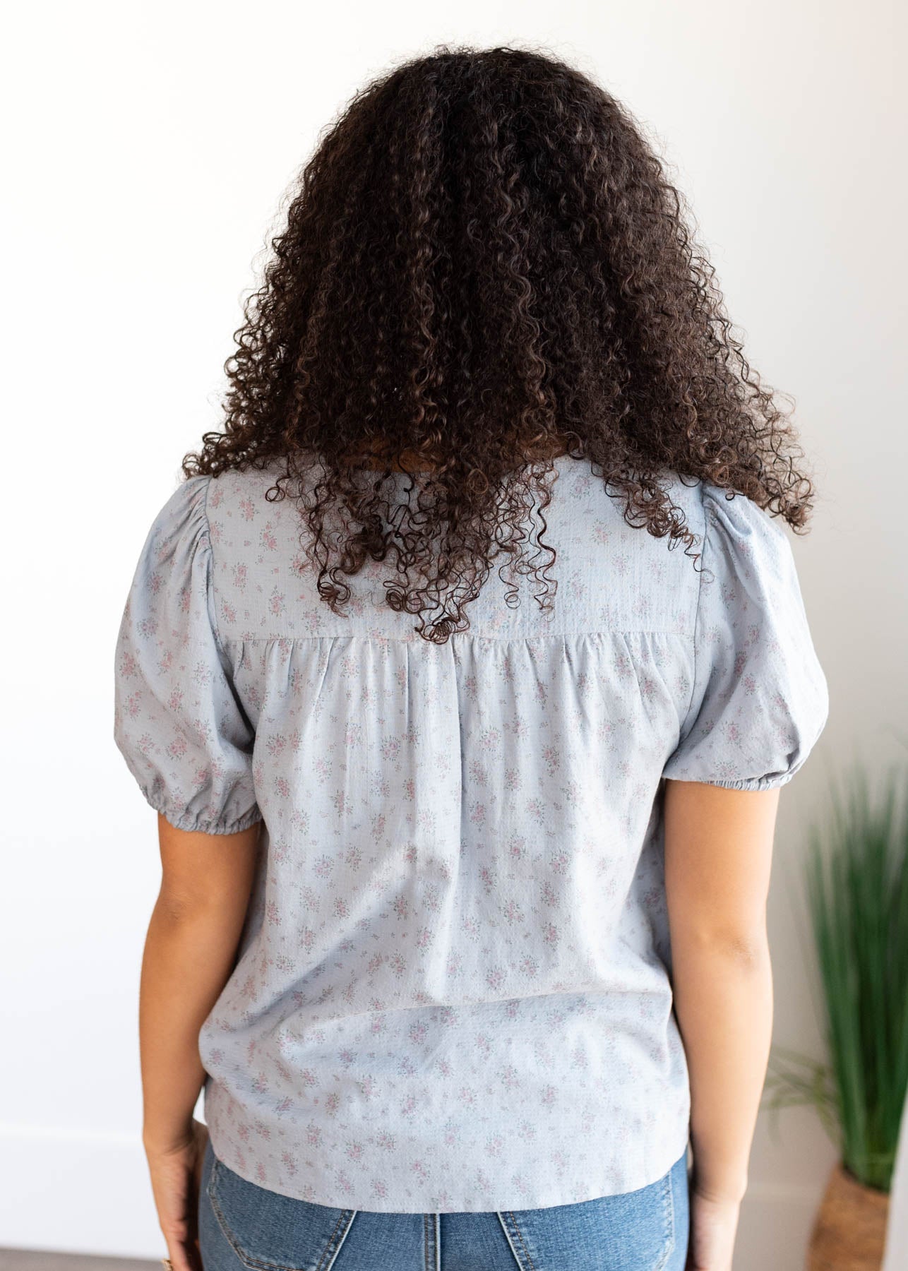 Back view of the blue rose floral blouse