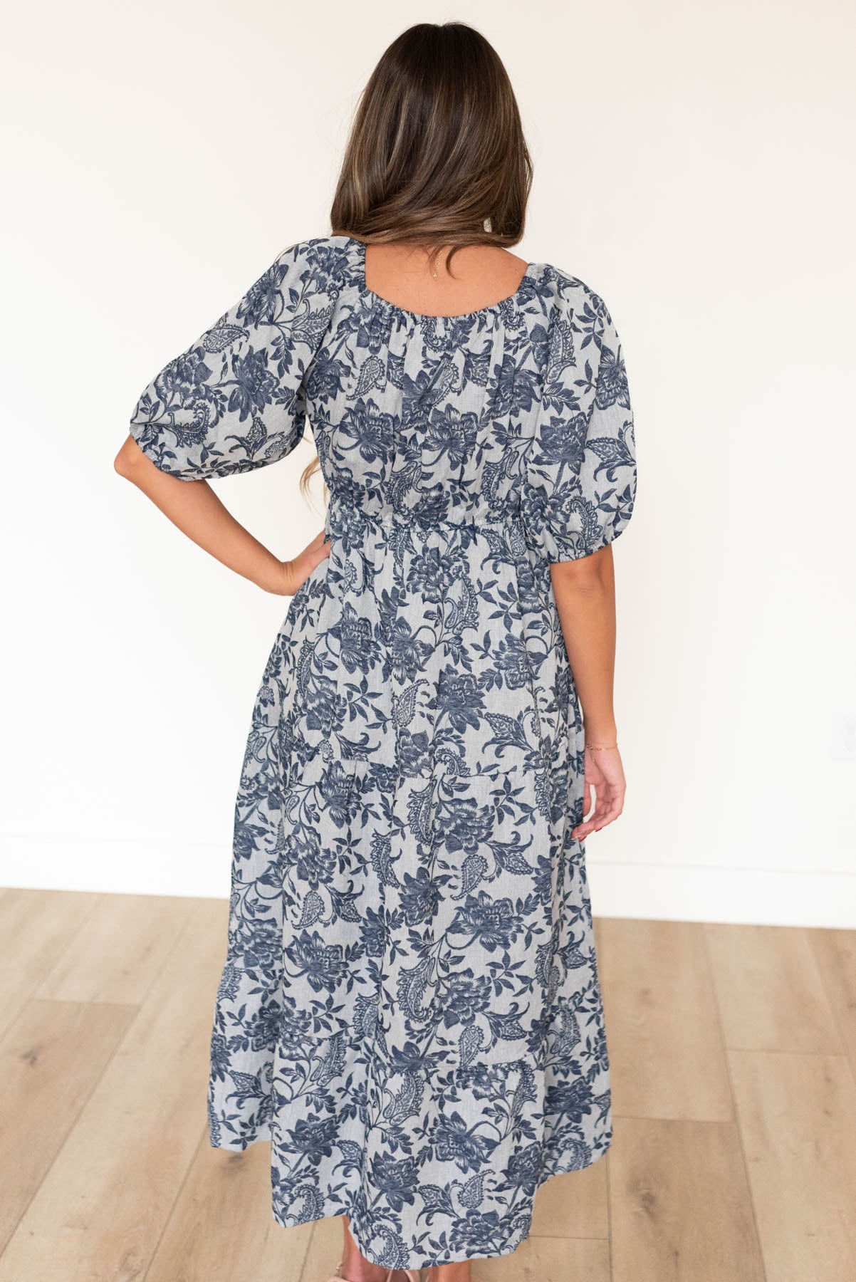 Back view of the navy floral dress