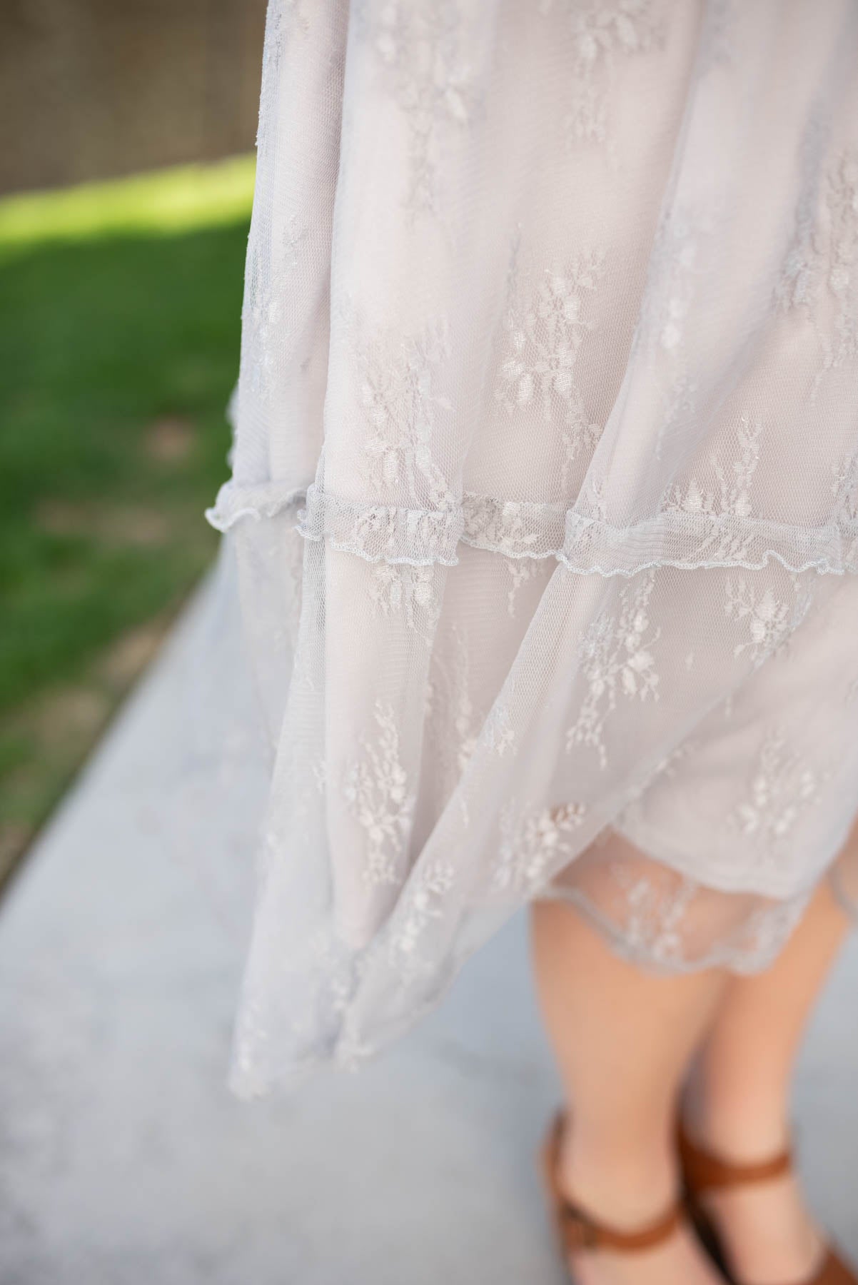 Close up of the lace on the plus size grey floral lace dress