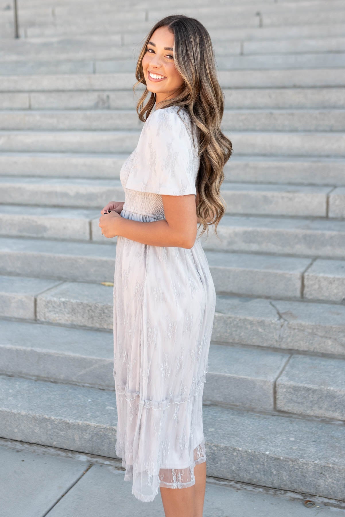 Side view of the grey floral lace dress