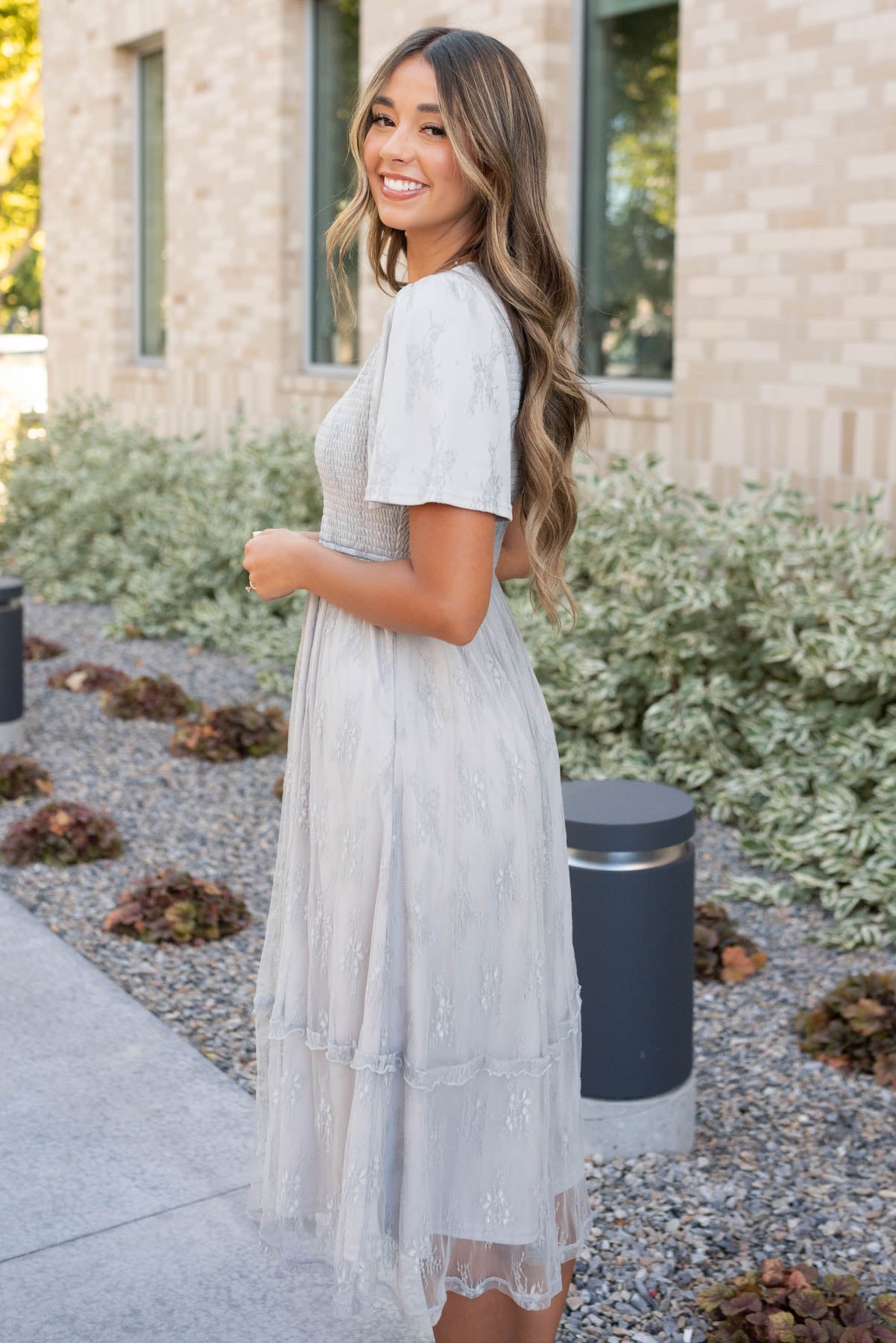 Side view of the grey floral lace dress