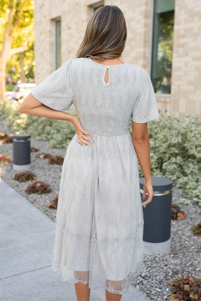 Back view of the grey floral lace dress