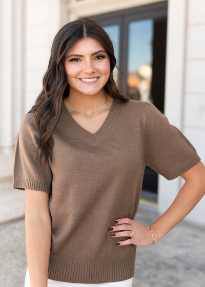 Close up of the taupe short sleeve sweater