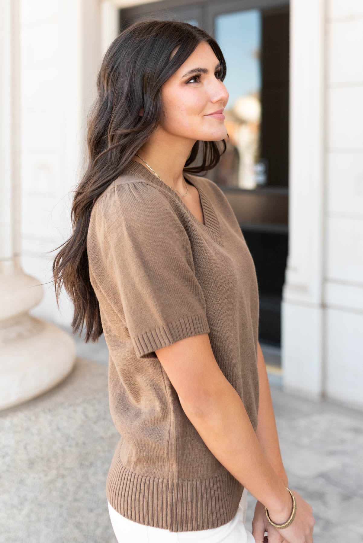 Side view of the taupe short sleeve printed jacket