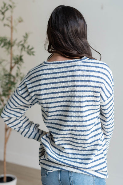 Back view of the indigo stripe long sleeve top