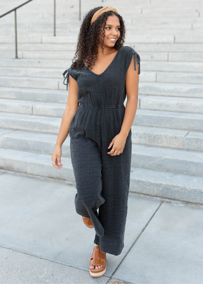 Black mineral wash jumpsuit with ties at the shoulders