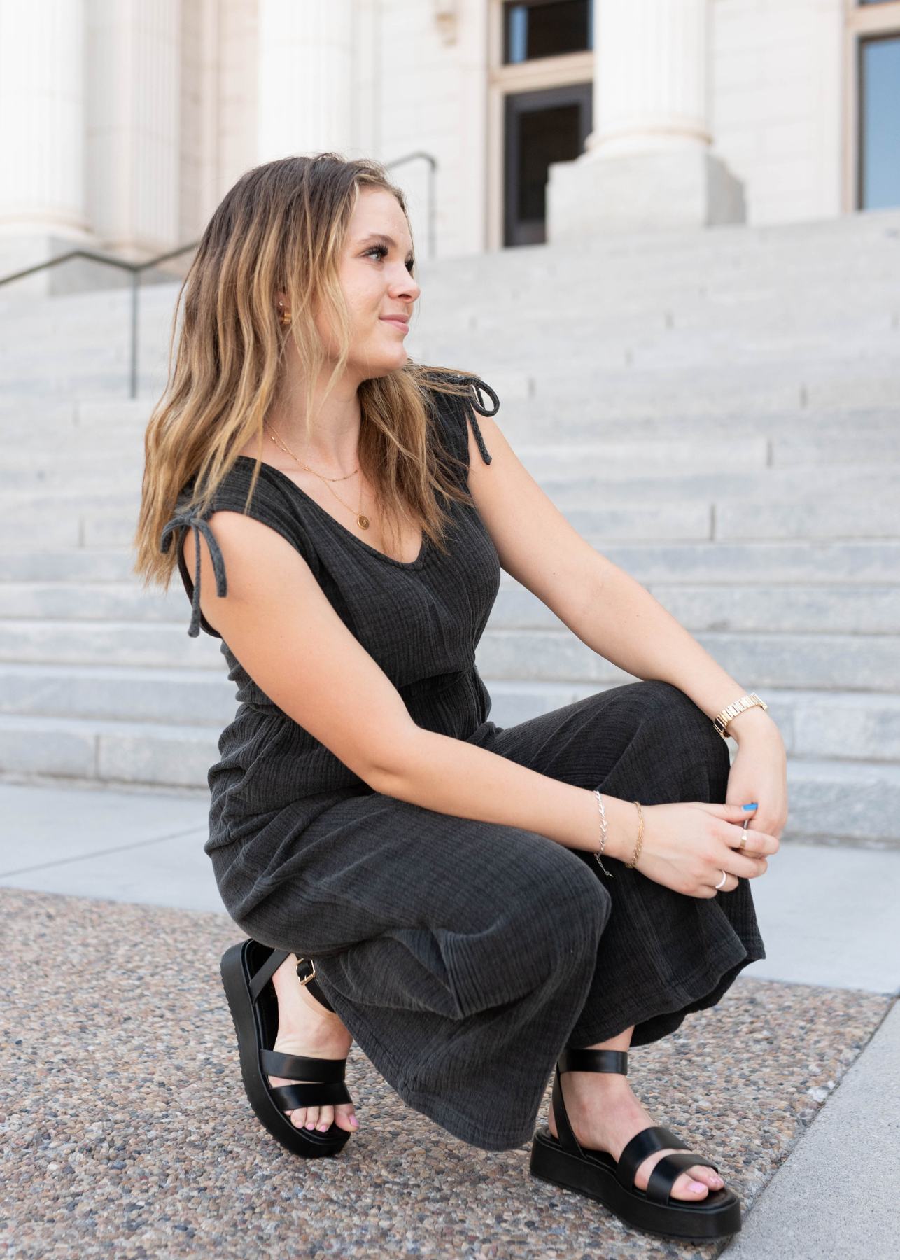 Black mineral wash jumpsuit with ties at the shoulder