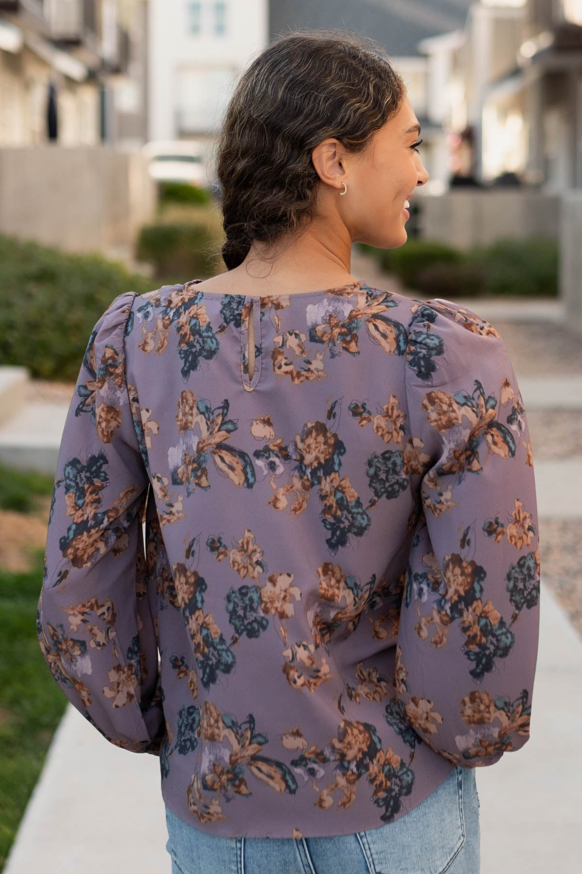 Back view of the plum floral blouse