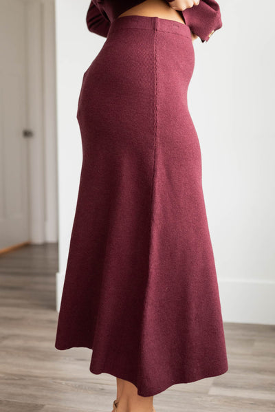 Side view of the burgundy knit skirt