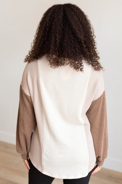 Back view of the chestnut color block pullover