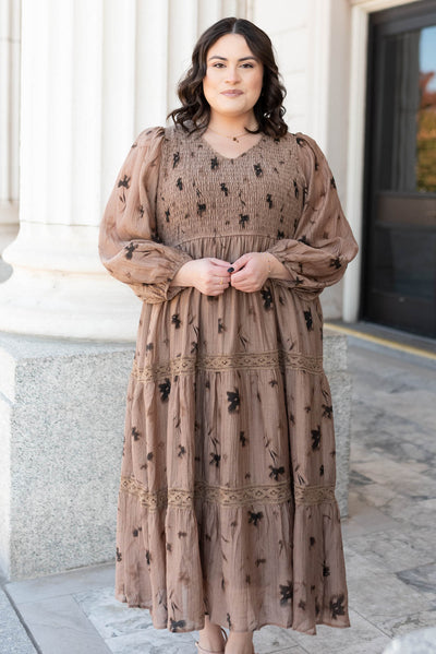 Long sleeve mocha floral tiered dress with front smocked bodice in plus size