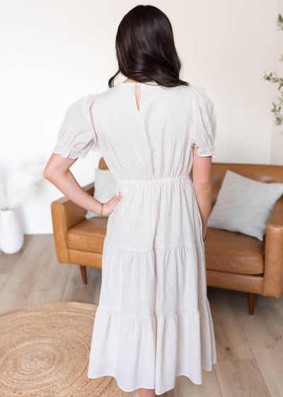 Back view of the cream ribbon dress