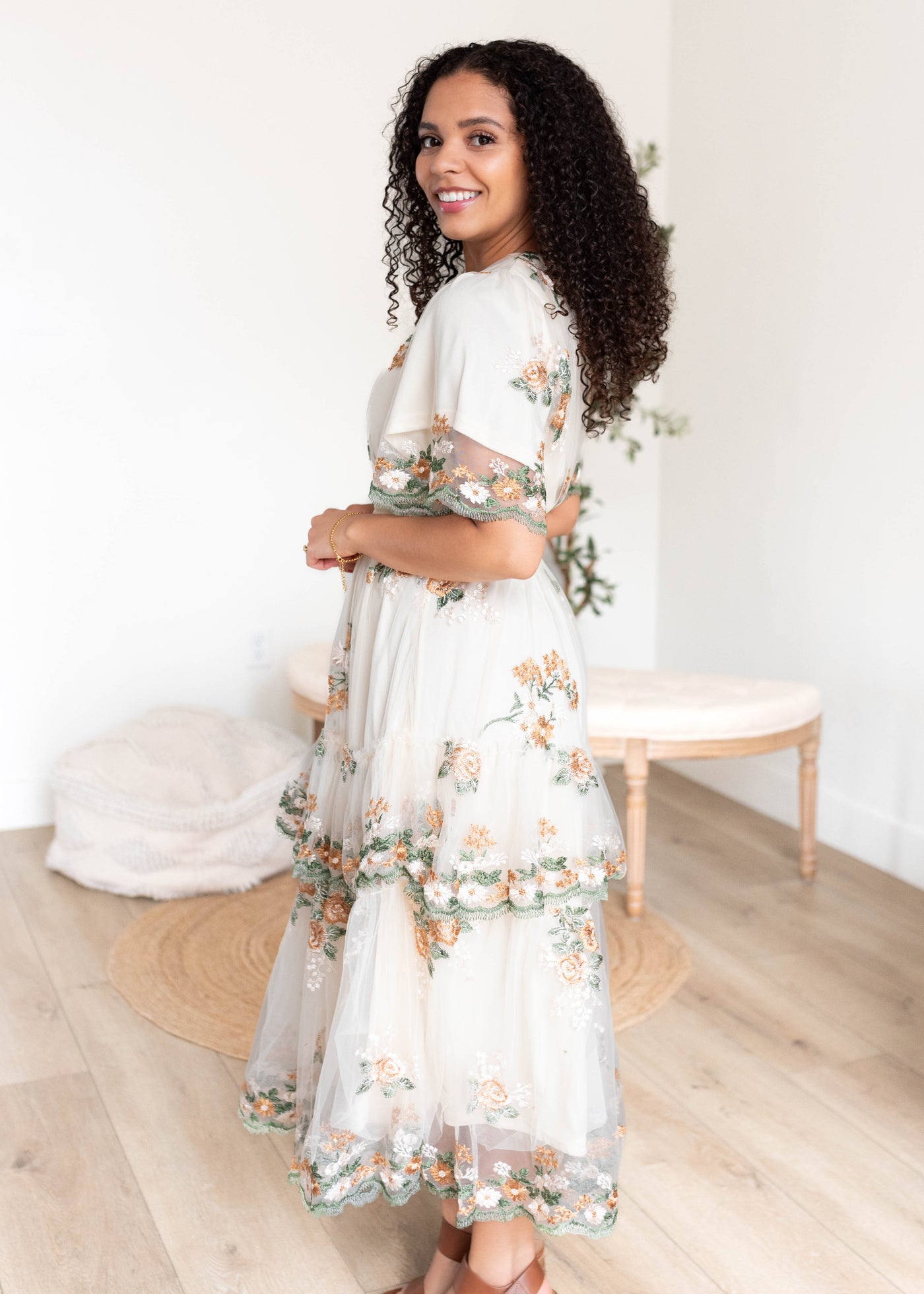 Side view of the wild flower taupe dress