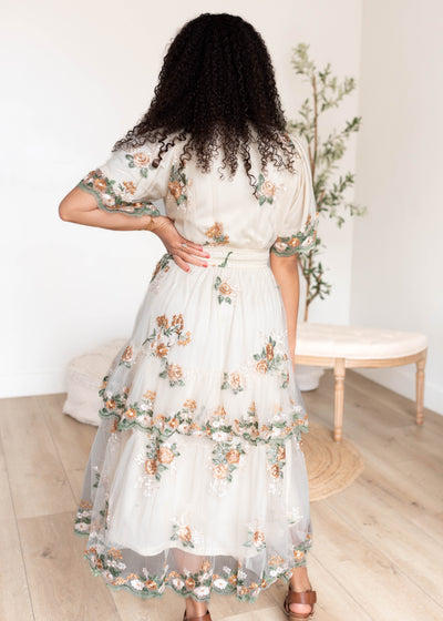 Back view of the wild flower taupe dress