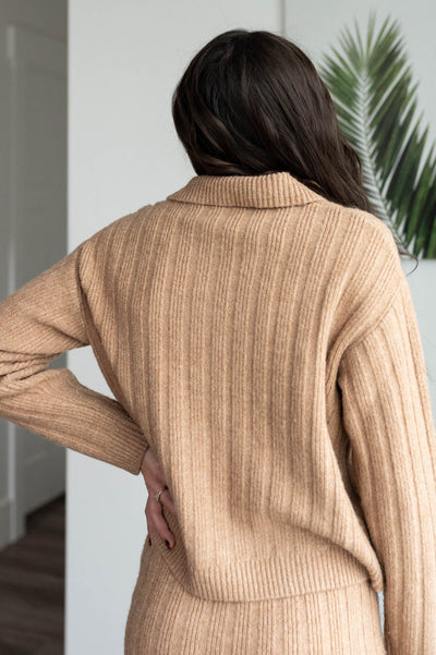 Back view of the camel ribbed sweater