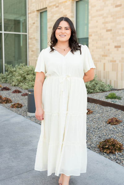 Cream buttond down dress with a v-neck in plus size