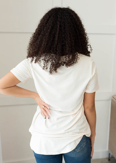 Back view of the cream v-neck top