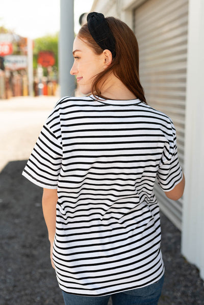 Back view of the black stripe top