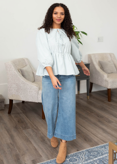 Peplum style light blue stripe top