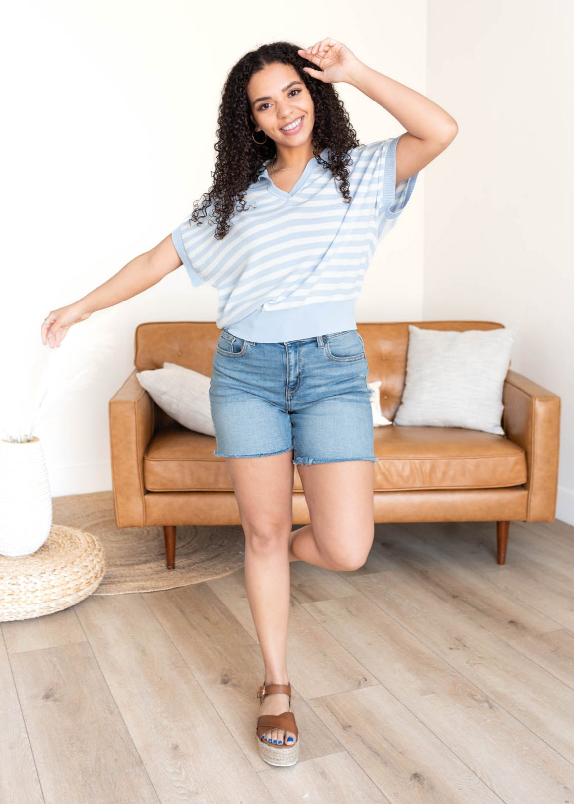 Blue collared top with short sleeves