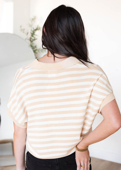 Back view of the taupe collared top