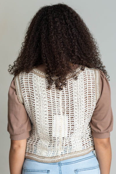 Back view of the cream floral crochet vest