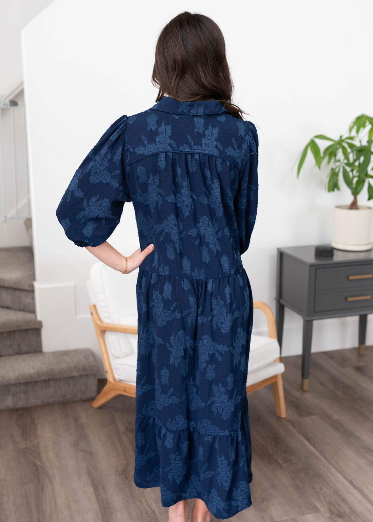 Back view of the navy floral collared dress