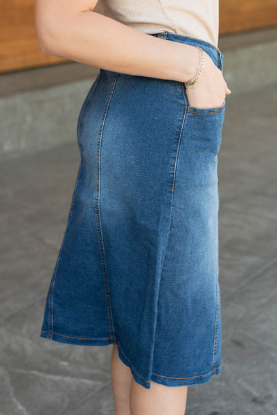 Side view of the indigo button skirt