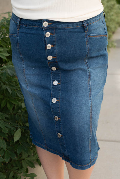 Front view of the plus size indigo button skirt