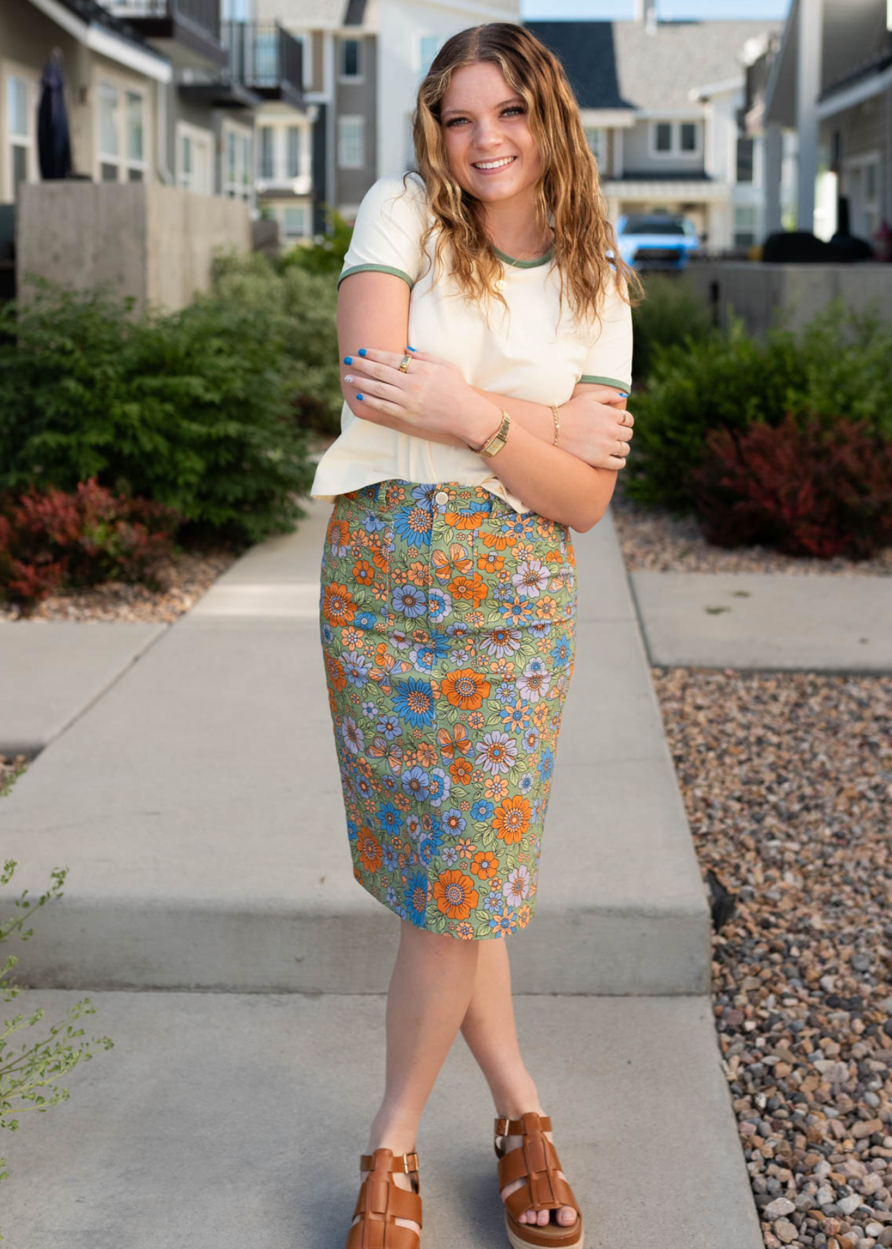 Front view of the green multi floral jean skirt